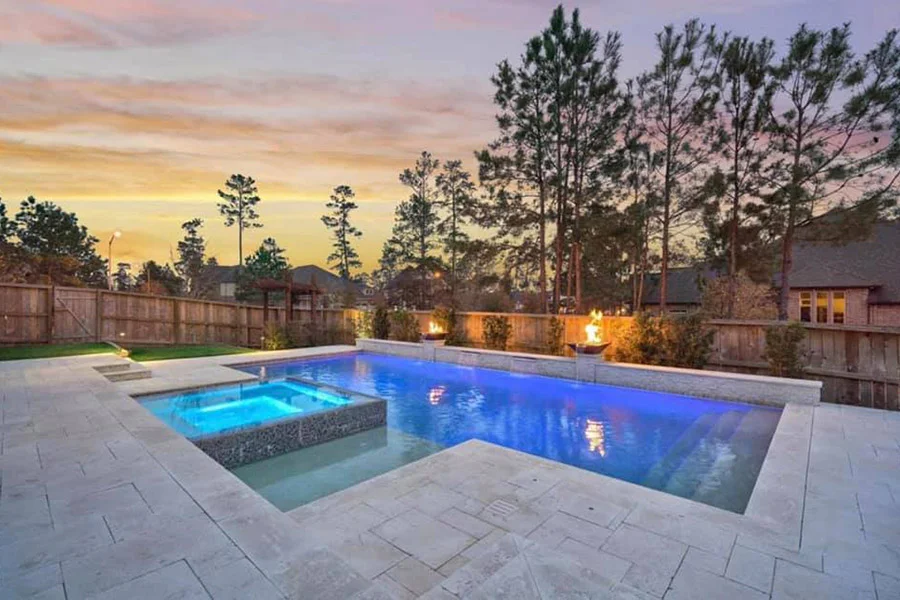 Houston backyard pool with integrated gas fire pit